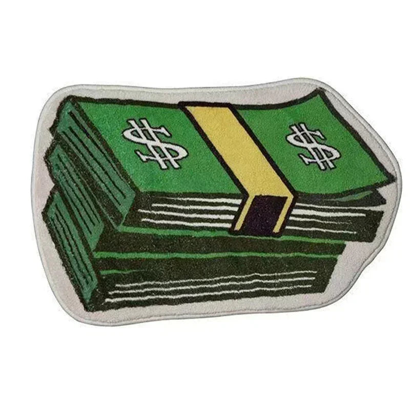 A rectangular green fabric rug featuring stacked dollar bills and a yellow stripe design.