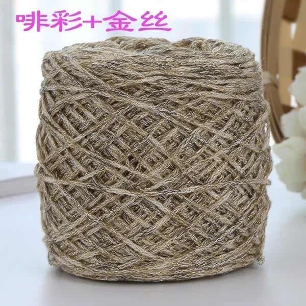 A ball of metallic silk yarn used for crocheting and knitting.