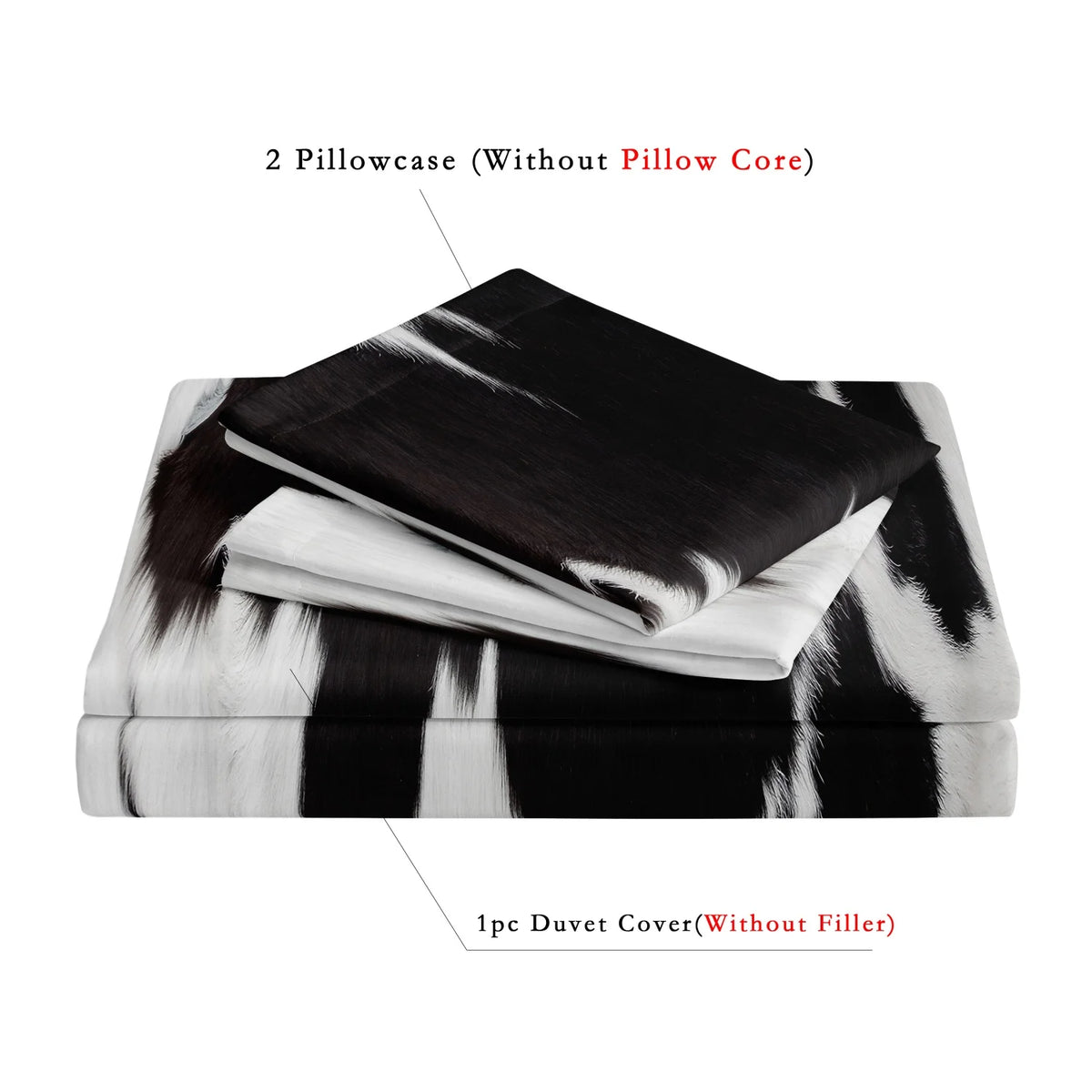 A set of two pillowcases and one duvet cover featuring a black and white cow print design.