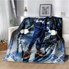 A dark blue and black anime-themed throw blanket featuring a character in a suit and wolf silhouettes.