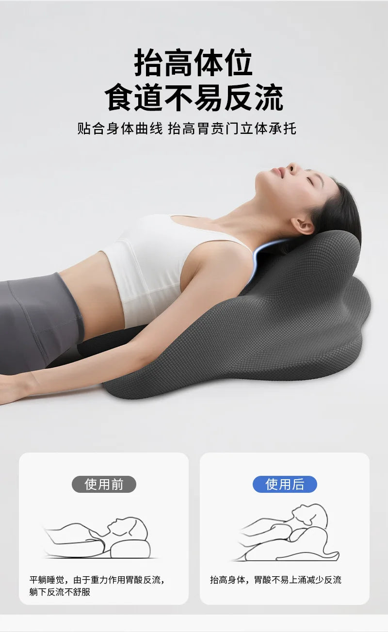 A person is lying down using a gray ergonomic memory foam pillow for back and head support.