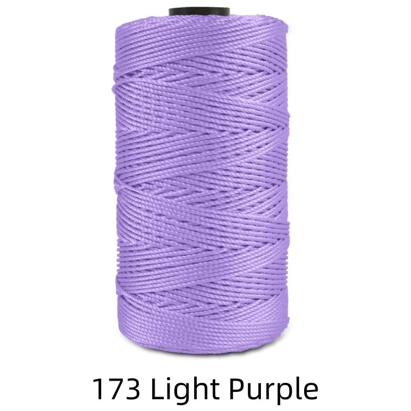 A spool of 1.5mm Light Purple ice silk crochet yarn for crafting and thread.