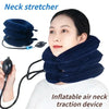 A woman is using a dark blue inflatable air neck traction device for stretching.