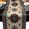 Bohemian linen table runner with an Indian-inspired geometric print featuring earthy tones and teal accents.