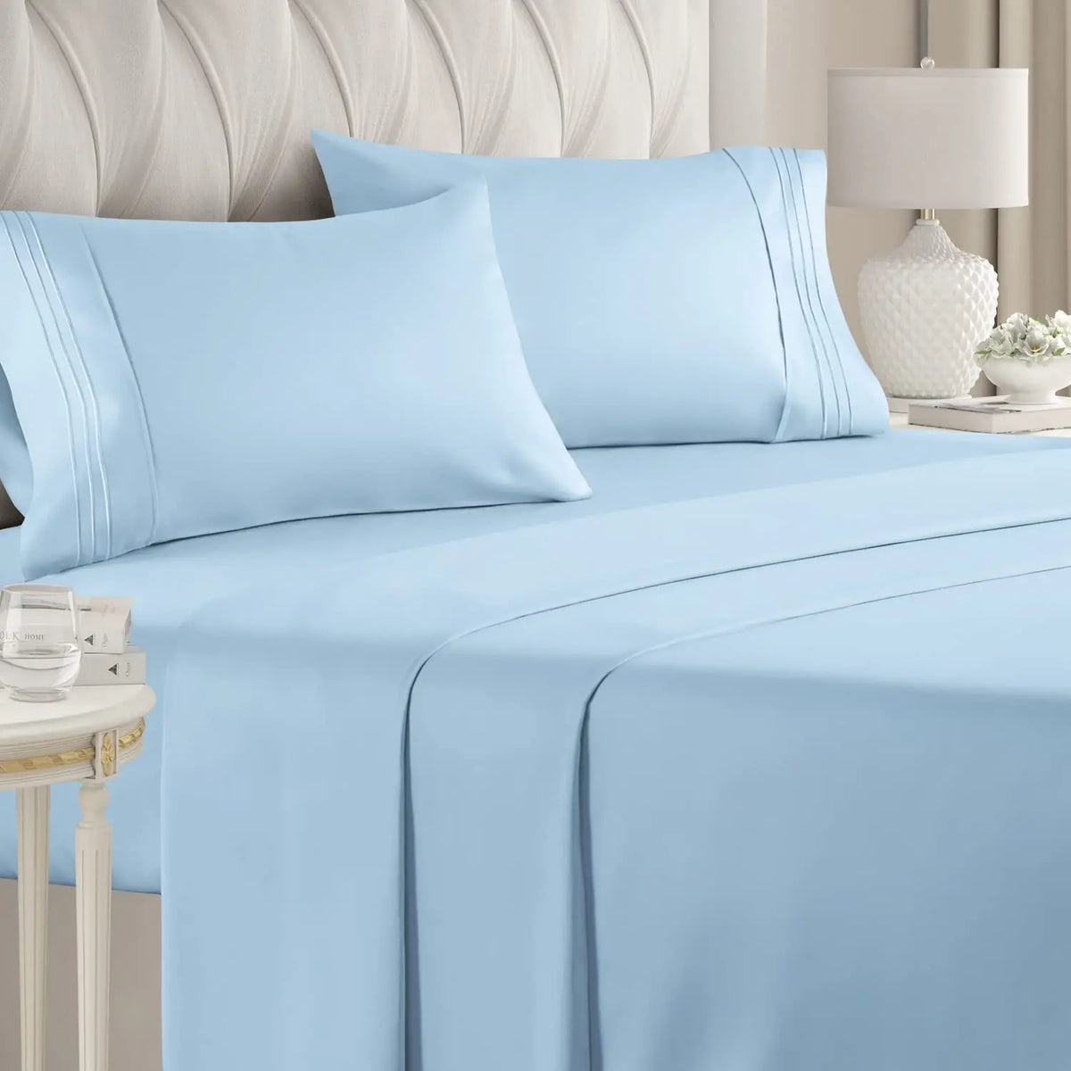 Light blue luxury microfiber bed sheet set featuring a duvet cover and pillowcases