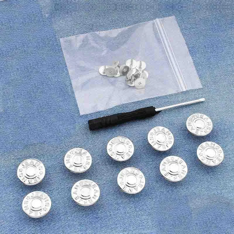 Silver metal button pins are displayed on a translucent pouch against a blue fabric background.