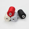 Four spools of polyester thread in red, gray, beige, and black for sewing and quilting