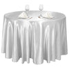 Elegant silver satin round tablecloth set with glassware and silverware