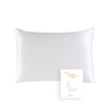 A white natural mulberry silk pillowcase is shown against a white background.