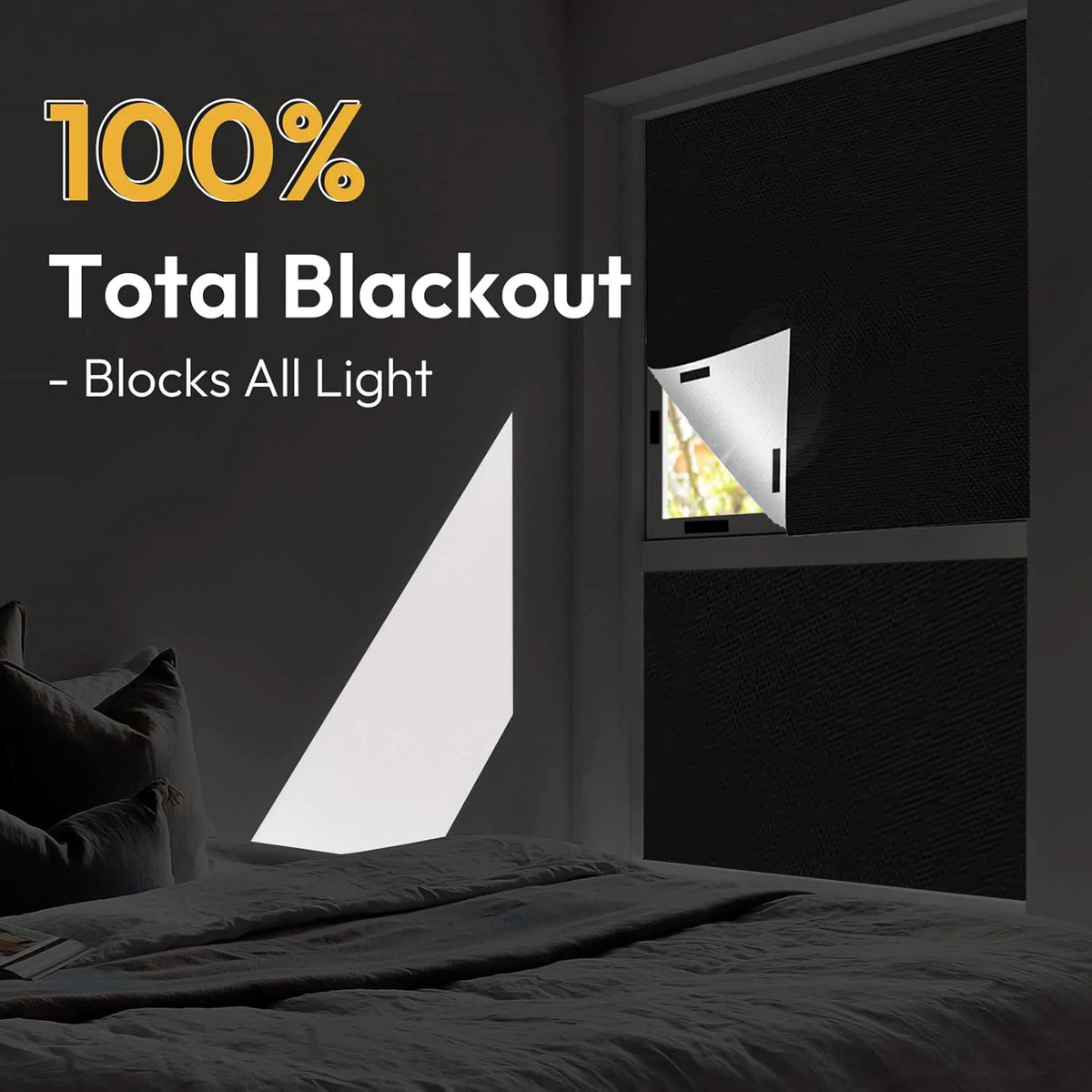 A close-up of black blackout curtains installed in a window frame, demonstrating total light blocking.