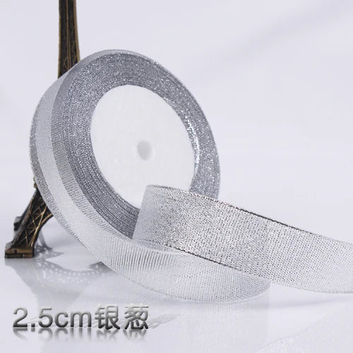 Roll of silver glitter organza ribbon for gift wrapping and DIY crafts