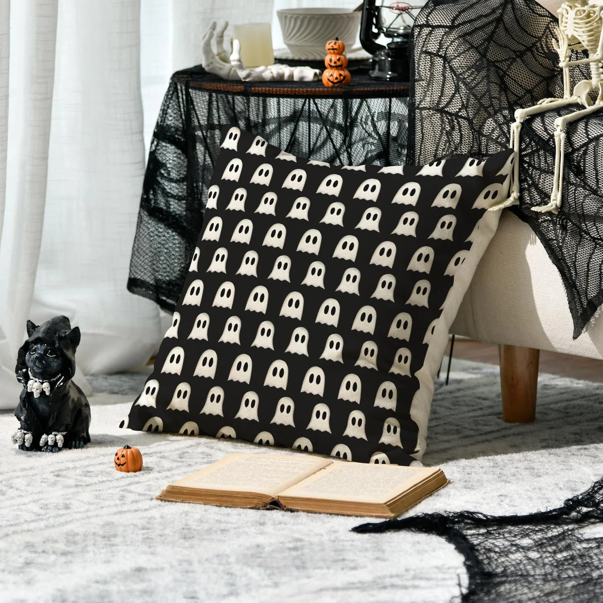 A set of four Halloween cushion covers featuring ghost, pumpkin, and skull designs displayed on a gray rug.