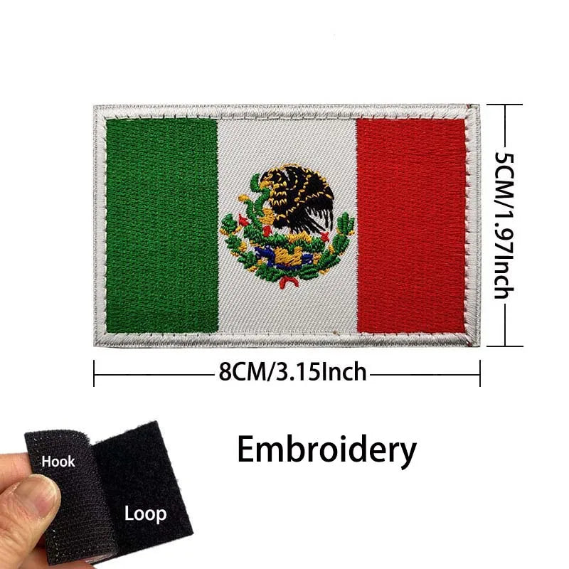 Embroidery of the Mexican flag featuring an eagle design on a fabric patch.
