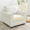 A cream-colored upholstered armchair with vertical stripes and a light beige seat cushion.