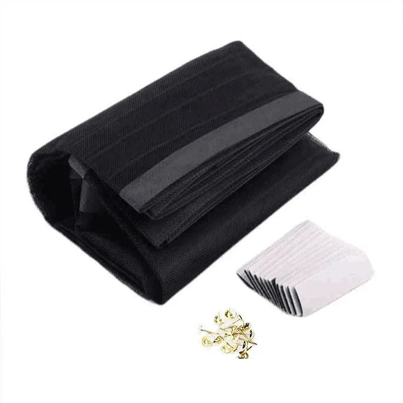 Black automatic mosquito net curtain folded neatly with a gold-colored decorative element.