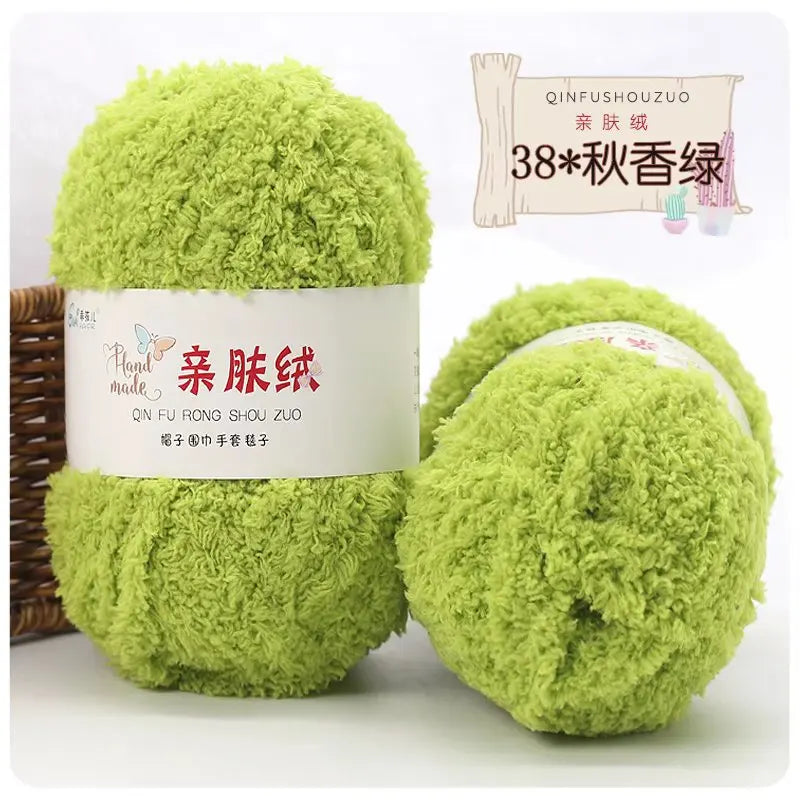 A ball of bright lime green soft coral velvet yarn for crafting displayed next to a label and wooden stick.
