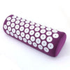 A purple acupressure relief mat and pillow set covered in white studs is shown lying horizontally.