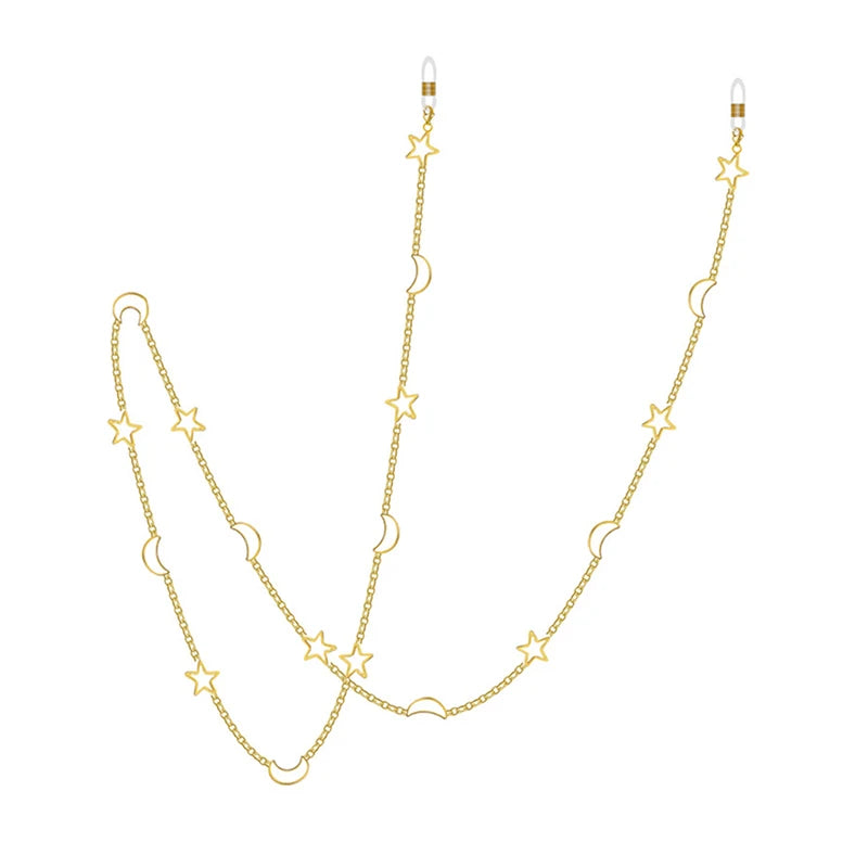 Gold locket necklace featuring a star and moon charm on a delicate chain.