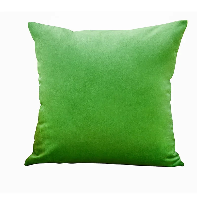 A square velvet throw pillow cover in a vibrant lime green color.