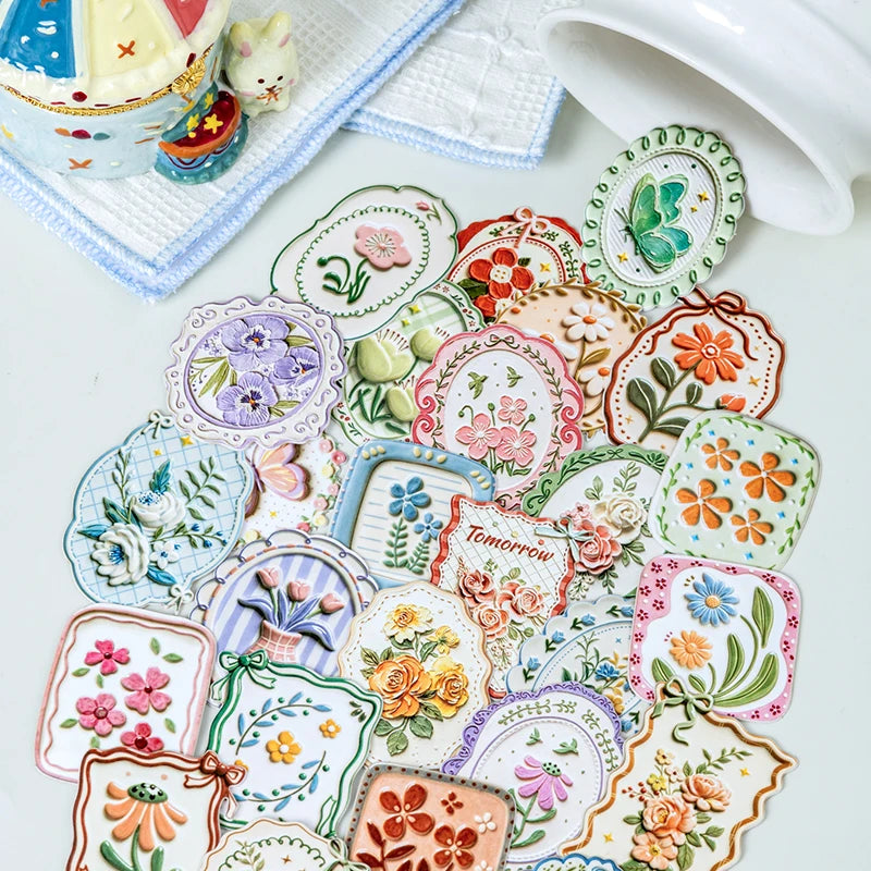 A collection of vintage botanical flower stickers in various colors and styles for journaling and scrapbooking