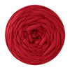 A ball of deep red soft T-shirt yarn used for crochet