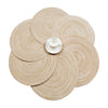 A set of six round, beige braided placemats for dining and party decor, with a small white cup in the center.