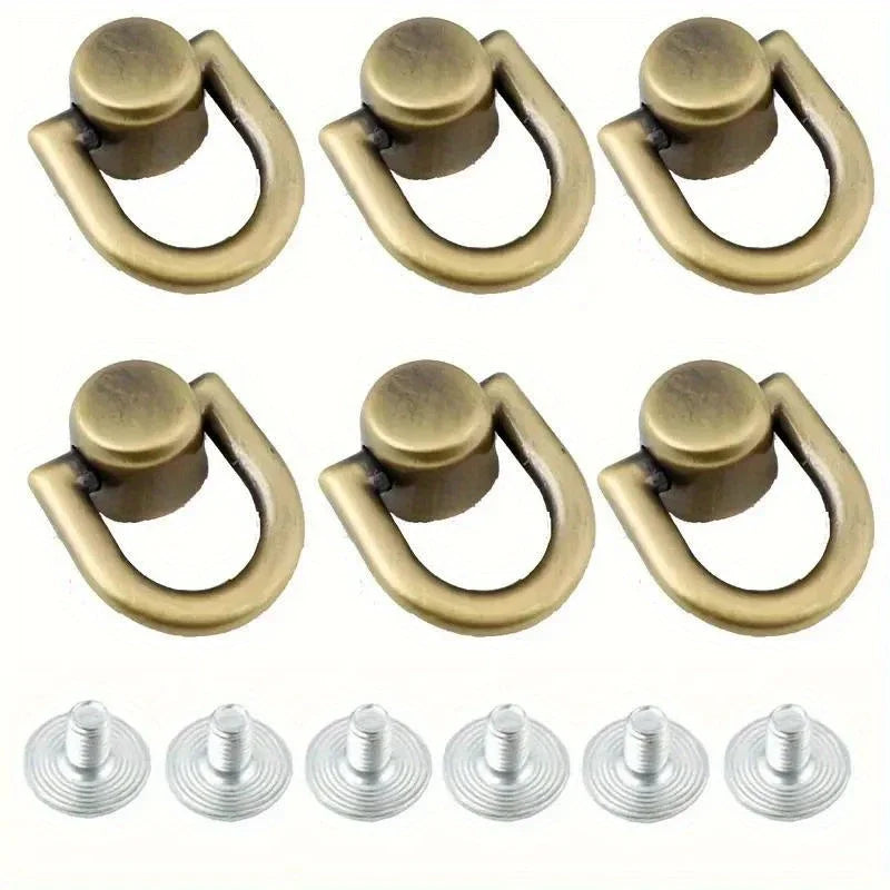 Set of metal D-shaped ring bag handles with screws in brass color