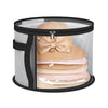 A clear cylindrical storage container holding several woven fabric hats and a bow