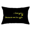Black decorative pillow cover with yellow text that reads I love you because we're ugly