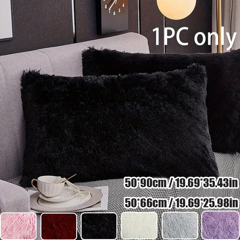 A black faux fur pillow cover displayed on a sofa, with various color options shown below.