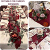 Burgundy cheesecloth table runner for rustic boho decor featuring deep red fabric and floral greenery.