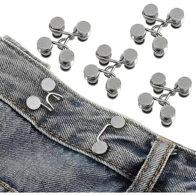 Adjustable button pins for jeans showing various silver and gold-toned pins on denim fabric
