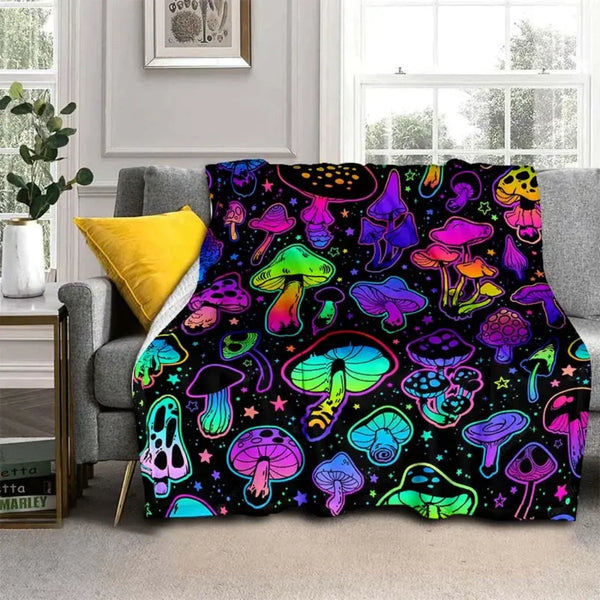 A colorful flannel throw blanket featuring a vibrant pattern of various mushrooms on a black background.