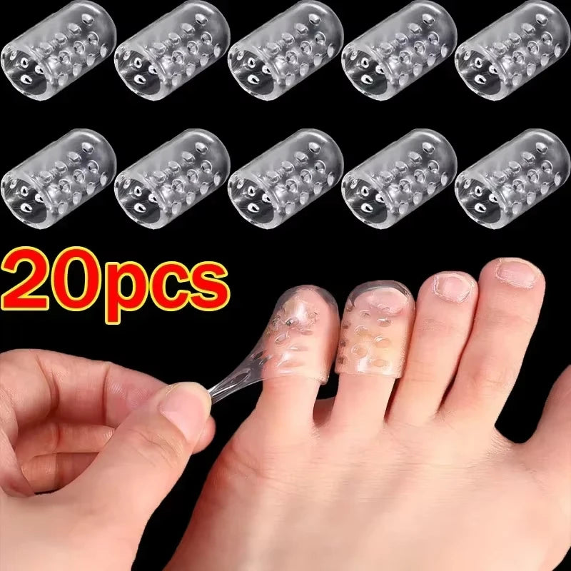 A set of transparent silicone toe and finger protectors shown next to a hand for scale.