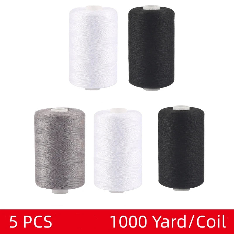Five spools of black and white polyester thread, 1000 yards per coil, for sewing and quilting.