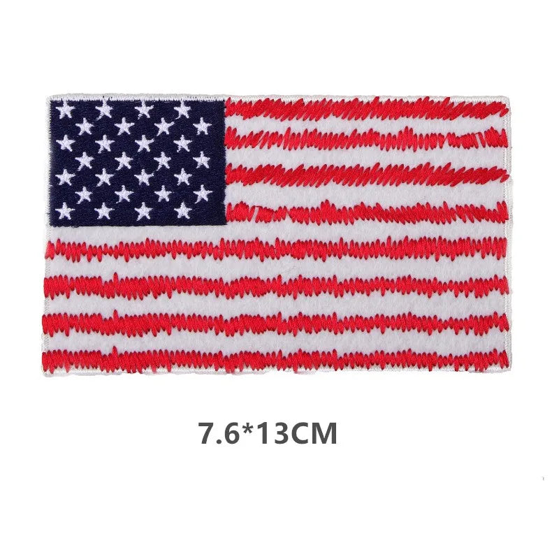Embroidered USA flag sew-on patch featuring the stars and stripes design.