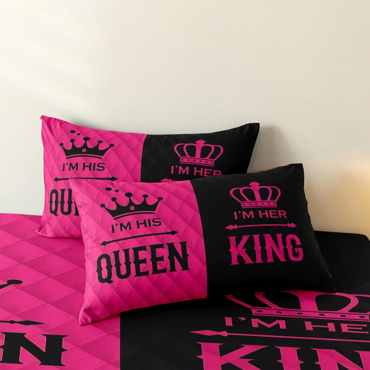 Pink and black crown print microfiber duvet set featuring text like I'm his, I'm her, queen, and king.