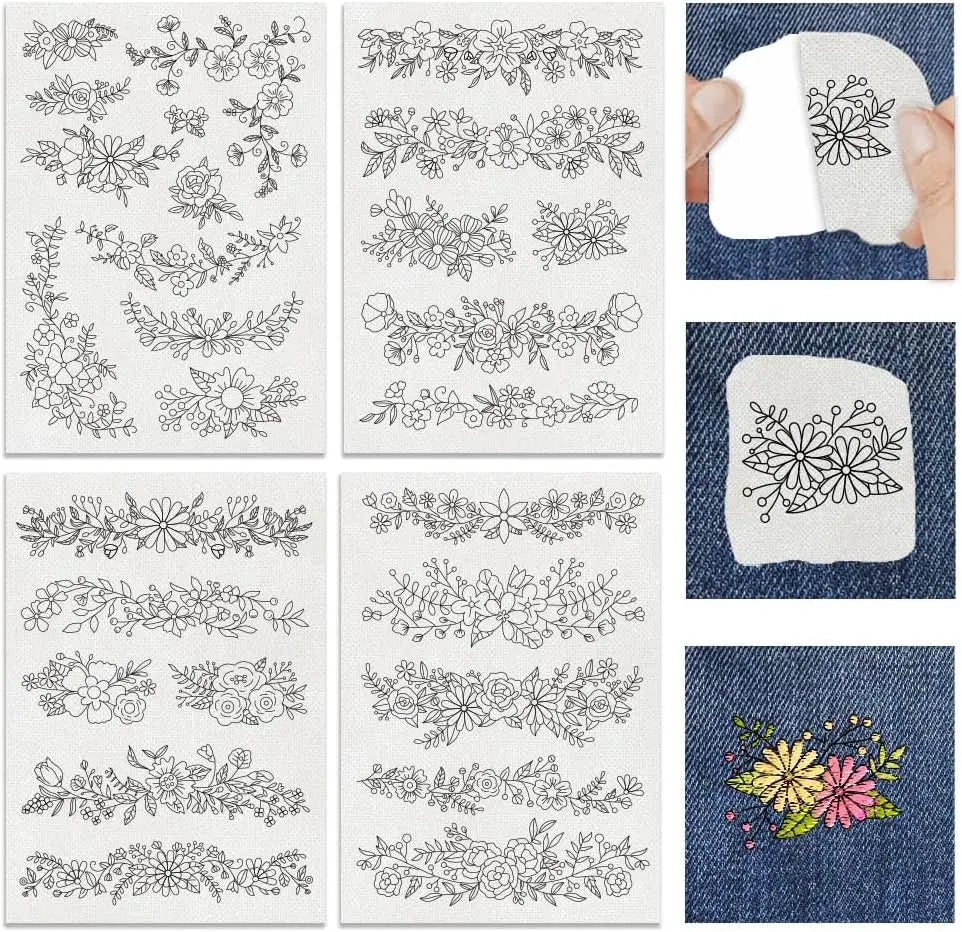 A collection of black line embroidery patterns printed on white fabric and displayed on denim fabric.