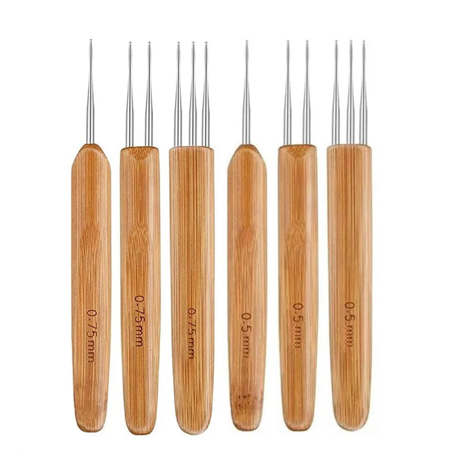 A set of five wooden crochet hooks for dreadlocks and braids