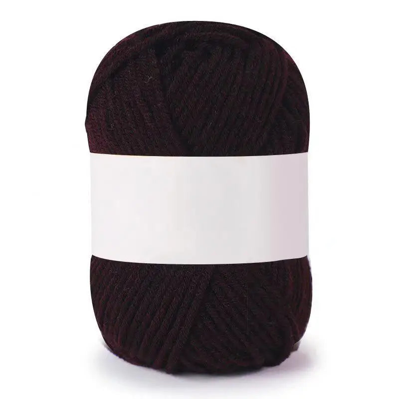 A ball of dark burgundy or maroon soft milk cotton knitting yarn.