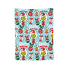 A colorful pattern featuring Christmas-themed graphics and the word GRINCH on a blue background.