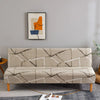 A beige sofa with geometric print spandex slipcovers featuring gray and white lines, placed in a modern room.