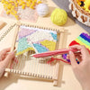 Hands are weaving colorful yarn into a fabric using a bamboo handloom kit with various colored yarns and a wooden frame.