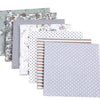 A stack of floral dot pattern cotton fabric squares in various muted green, gray, and white tones.