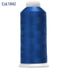 A spool of royal blue embroidery thread labeled Col.1842