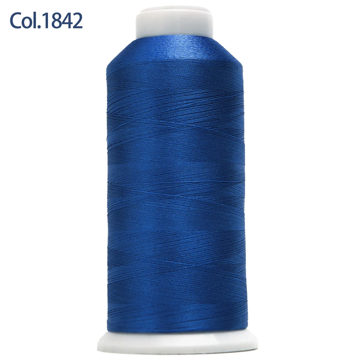 A spool of royal blue embroidery thread labeled Col.1842