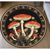 A round rug featuring a dark background with an illustration of several orange and white mushrooms.