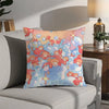A colorful cartoon pillow featuring pink and orange ponies swimming in light blue bubbles