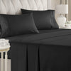 A set of black luxury microfiber bed sheets with deep pockets draped on a bed.