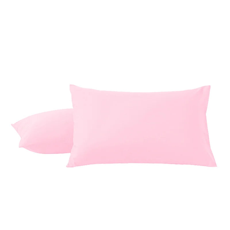 A pink microfiber pillow cover is shown, part of a two-pack.